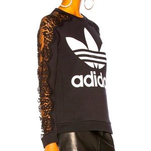 Stella McCartney X Adidas all season sweater.   — Medium. Guaranteed authentic!